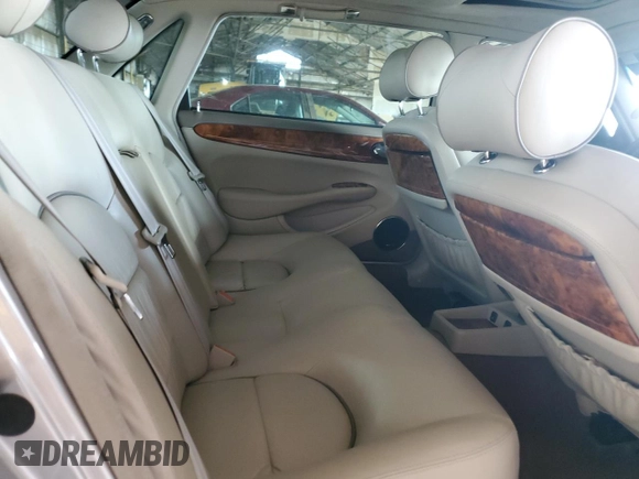 2000 Jaguar XJ with VIN SAJDA25B8YMF04079, listed as a Copart auction lot 50592595 with 131,647 mi miles and Salvage title. Bid and sale history available at DreamBid. Image 10.
