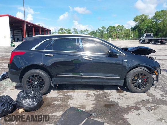 2018 Cadillac XT5 FWD with VIN 1GYKNARS2JZ160862, listed as a IAAI auction lot 42584234 with 152,785 mi miles and . Bid and sale history available at DreamBid. Image 14.