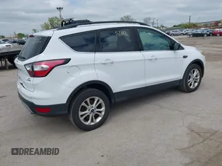 2018 Ford Escape SE z VIN 1FMCU9GDXJUC99453, wystawiony jako IAAI lot #42195202 z przebiegiem 191 840 mil mil oraz . Historia ofert i sprzedaży dostępna na DreamBid. Obrazek 4.