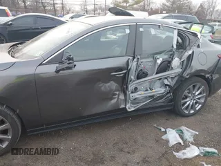 2023 Mazda 3 S Select with VIN 3MZBPABM2PM354066, listed as a IAAI auction lot 41339983 with 13,536 mi miles and . Bid and sale history available at DreamBid. Image 6.
