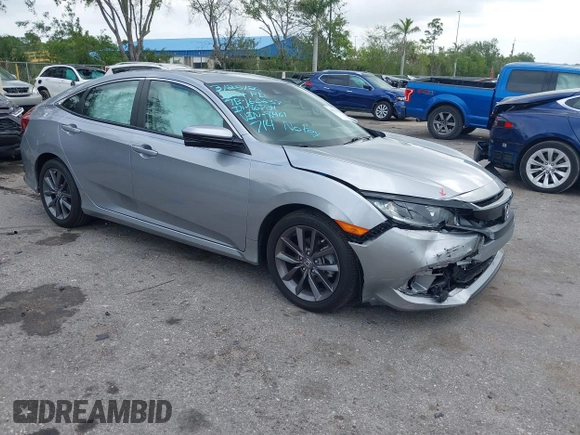 2021 Honda Civic Sedan EX-L with VIN 19XFC1F77ME008461, listed as a IAAI auction lot 41920231 with 31,912 mi miles. Bid and sale history available at carsss.com. Image 1.