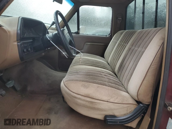 1989 Ford F-150 with VIN 1FTDF15Y7KNB52741, listed as a Copart auction lot 41561205 with 212,932 mi miles and Salvage Title. Bid and sale history available at carsss.com. Image 7.