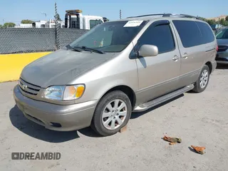 2002 Toyota Sienna LE with VIN 4T3ZF13C72U473555, listed as a IAAI auction lot 42426344 with 330,911 mi miles and . Bid and sale history available at DreamBid. Image 2.