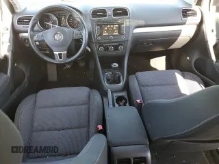 2014 Volkswagen Golf TDI w/Sunroof & Nav z VIN WVWNM7AJ2EW006137, wystawiony jako Copart lot #57031715 z przebiegiem 136 654 mil mil oraz Szkoda całkowita • Salvage title. Historia ofert i sprzedaży dostępna na DreamBid. Obrazek 8.