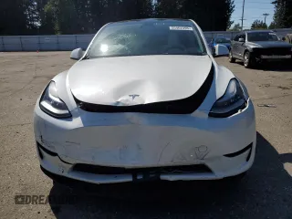 2020 Tesla Model Y Long Range with VIN 5YJYGDEF9LF023060, listed as a Copart auction lot 55462395 with 58,211 mi miles and Salvage Title. Bid and sale history available at DreamBid. Image 5.