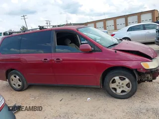 2002 Honda Odyssey EX with VIN 5FNRL18612B028570, listed as a IAAI auction lot 42491201 with 203,401 mi miles and . Bid and sale history available at DreamBid. Image 14.
