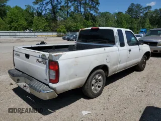 1999 Nissan Frontier XE with VIN 1N6DD26S3XC326231, listed as a Copart auction lot 51710615 with 228,174 mi miles and Salvage title. Bid and sale history available at DreamBid. Image 3.
