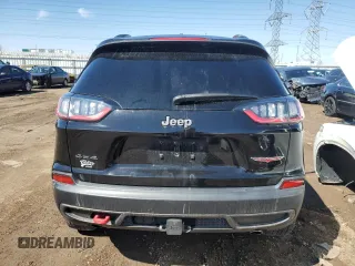 2022 Jeep Cherokee Trailhawk with VIN 1C4PJMBX9ND516418, listed as a Copart auction lot 49733765 with 55,624 mi miles and Salvage title. Bid and sale history available at DreamBid. Image 6.