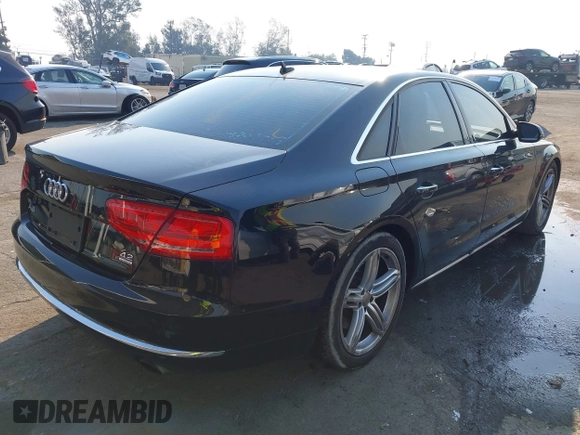 2011 Audi A8 with VIN WAUAVAFD6BN023937, listed as a IAAI auction lot 41288464 with 158,127 mi miles and . Bid and sale history available at DreamBid. Image 4.