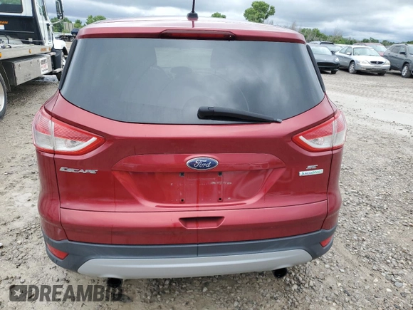 2013 Ford Escape SE with VIN 1FMCU0GX4DUC78270, listed as a Copart auction lot 58935755 with 163,837 mi miles and Salvage title. Bid and sale history available at DreamBid. Image 6.