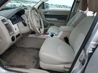 2009 Mercury Mariner with VIN 4M2CU81G09KJ06441, listed as a Copart auction lot 57080215 with 177,893 mi miles and Salvage title. Bid and sale history available at DreamBid. Image 7.