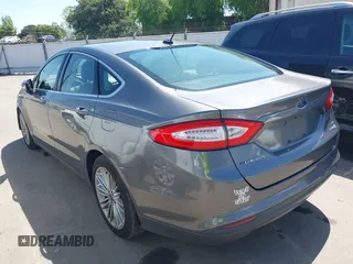 2014 Ford Fusion SE Hybrid with VIN 3FA6P0LU9ER142204, listed as a IAAI auction lot 41964308 with 177,499 mi miles. Bid and sale history available at carsss.com. Image 3.
