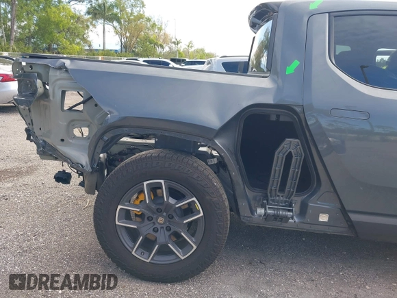 2022 Rivian R1T Launch Edition with VIN 7FCTGAAL9NN004060, listed as a IAAI auction lot 41637884 with 40,268 mi miles. Bid and sale history available at carsss.com. Image 6.