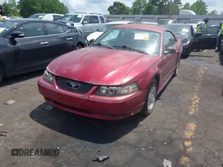 2003 Ford Mustang Standard z VIN 1FAFP40473F441647, wystawiony jako IAAI lot #42179189 z przebiegiem 138 460 mil mil oraz . Historia ofert i sprzedaży dostępna na DreamBid. Obrazek 17.