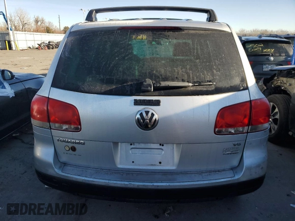 2004 Volkswagen Touareg z VIN WVGBC67L94D021426, wystawiony jako Copart lot #44059535 z przebiegiem 148 887 mil mil oraz Czysty tytuł • Clean title. Historia ofert i sprzedaży dostępna na DreamBid. Obrazek 6.