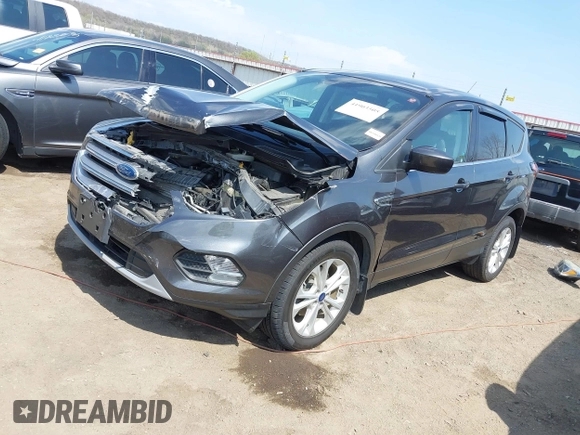 2017 Ford Escape SE z VIN 1FMCU0GD9HUD28110, wystawiony jako IAAI lot #41903505 z przebiegiem 66 808 mil mil oraz . Historia ofert i sprzedaży dostępna na DreamBid. Obrazek 18.