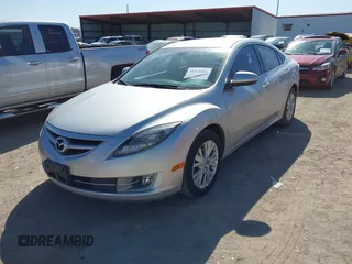 2009 Mazda 6 i Touring with VIN 1YVHP82A795M31562, listed as a IAAI auction lot 41970484 with 128,724 mi miles and . Bid and sale history available at carsss.com. Image 2.