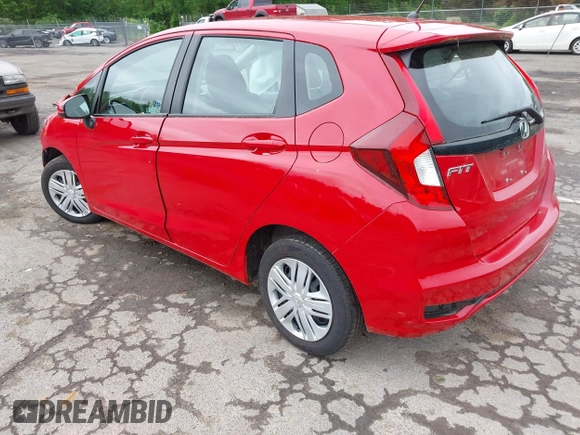 2019 Honda Fit LX z VIN 3HGGK5H43KM727020, wystawiony jako IAAI lot #42372741 z przebiegiem 56 000 mil mil oraz . Historia ofert i sprzedaży dostępna na DreamBid. Obrazek 3.