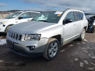 2011 Jeep Compass with VIN 1J4NT1FB4BD252724, listed as a IAAI auction lot 41247389 with 162,028 mi miles. Bid and sale history available at carsss.com. Image 2.