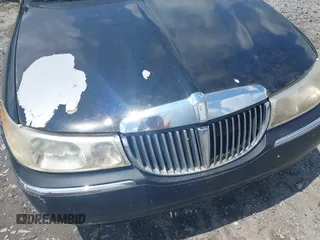 1999 Lincoln Town Car Executive z VIN 1LNHM81W9XY684966, wystawiony jako IAAI lot #42448736 z przebiegiem 175 698 mil mil oraz . Historia ofert i sprzedaży dostępna na DreamBid. Obrazek 6.