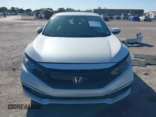 2020 Honda Civic LX z VIN 19XFC2F68LE206395, wystawiony jako IAAI lot #41720356 z przebiegiem 38 037 mil mil oraz . Historia ofert i sprzedaży dostępna na DreamBid. Obrazek 13.