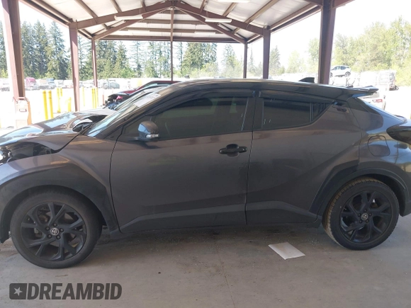 2021 Toyota C-HR LE with VIN JTNKHMBX5M1129253, listed as a IAAI auction lot 42169707 with 54,312 mi miles and . Bid and sale history available at DreamBid. Image 15.