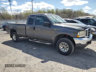 2003 Ford F-250 XL with VIN 1FTNX21L33EB87036, listed as a Copart auction lot 51774135 with 240,245 mi miles and Salvage title. Bid and sale history available at DreamBid. Image 4.