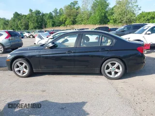 2014 BMW 3 Series 328i xDrive with VIN WBA3B5G56ENS06890, listed as a IAAI auction lot 42168982 with 133,664 mi miles. Bid and sale history available at carsss.com. Image 14.