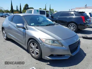 2011 Honda CR-Z EX with VIN JHMZF1D61BS002811, listed as a IAAI auction lot 42140932 with 113,164 mi miles. Bid and sale history available at carsss.com. Image 1.