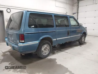 1992 Dodge Grand Caravan with VIN 1B4GK44R1NX248133, listed as a IAAI auction lot 42118680 with 188,949 mi miles and . Bid and sale history available at DreamBid. Image 4.