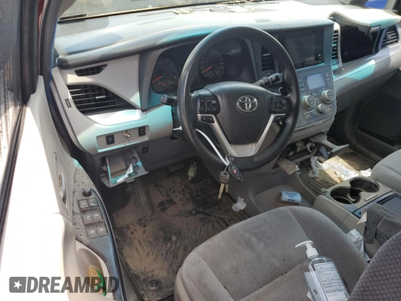 2015 Toyota Sienna LE AAS with VIN 5TDKK3DC9FS571386, listed as a Copart auction lot 52040875 with Not Provided miles and Salvage Title. Bid and sale history available at DreamBid. Image 8.