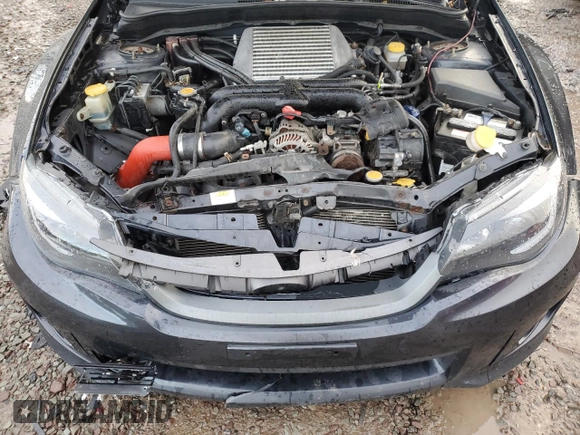 2012 Subaru WRX WRX z VIN JF1GV7E6XCG011210, wystawiony jako Copart lot #81972274 z przebiegiem 136 255 mil mil oraz Szkody całkowita. Historia ofert i sprzedaży dostępna na DreamBid. Obrazek 11.