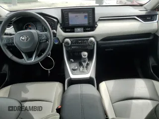 2022 Toyota RAV4 Hybrid XLE Premium with VIN 4T3B6RFV5NU074838, listed as a Copart auction lot 56697215 with 61,309 mi miles and Salvage title. Bid and sale history available at DreamBid. Image 8.
