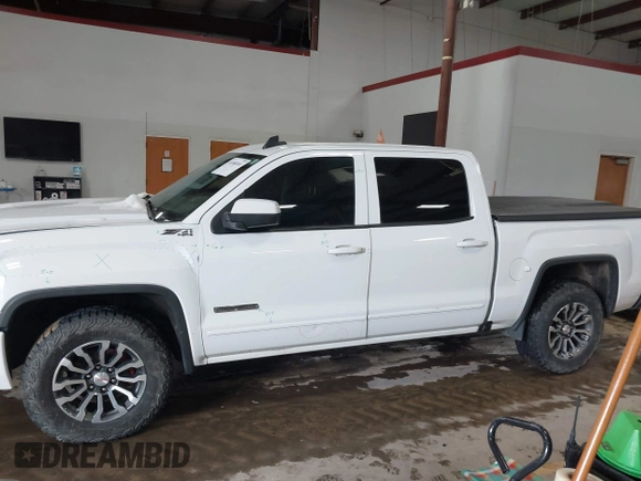 2017 GMC Sierra 1500 SLE z VIN 3GTU2MEC4HG374723, wystawiony jako IAAI lot #41400381 z przebiegiem 141 896 mil mil oraz . Historia ofert i sprzedaży dostępna na DreamBid. Obrazek 14.