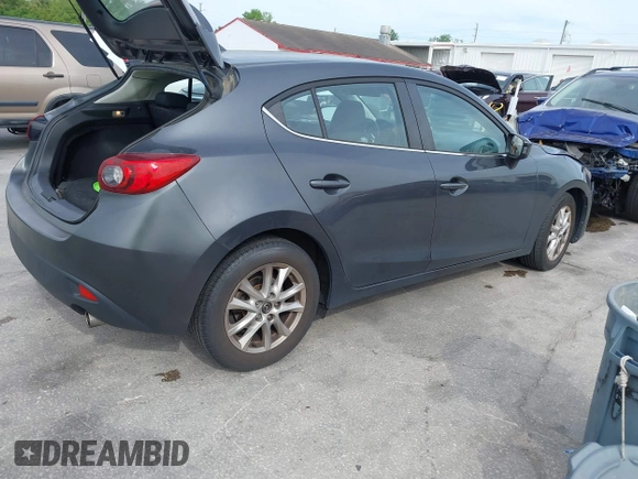 2015 Mazda 3 i Touring with VIN JM1BM1L79F1218498, listed as a IAAI auction lot 41876820 with 87,602 mi miles and . Bid and sale history available at carsss.com. Image 4.