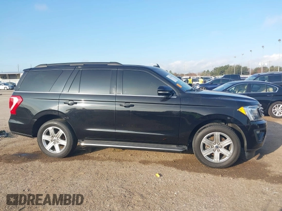 2019 Ford Expedition XLT with VIN 1FMJU1JT9KEA16156, listed as a IAAI auction lot 41472260 with 154,097 mi miles and . Bid and sale history available at DreamBid. Image 14.