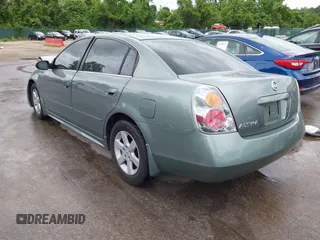 2003 Nissan Altima S z VIN 1N4AL11DX3C295443, wystawiony jako IAAI lot #42278216 z przebiegiem 145 415 mil mil oraz . Historia ofert i sprzedaży dostępna na DreamBid. Obrazek 3.