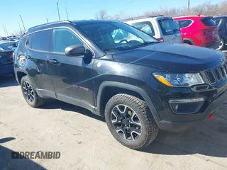 2019 Jeep Compass Trailhawk with VIN 3C4NJDDB1KT671642, listed as a IAAI auction lot 41810138 with 119,029 mi miles and . Bid and sale history available at carsss.com. Image 13.