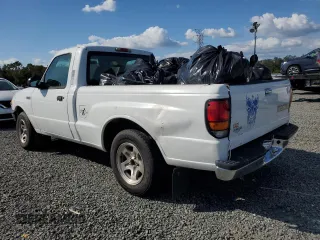 1999 Mazda B-Series 2WD Truck SX with VIN 4F4YR12C4XTM40289, listed as a Copart auction lot 77544354 with 192,046 mi miles and Salvage Title. Bid and sale history available at carsss.com. Image 2.