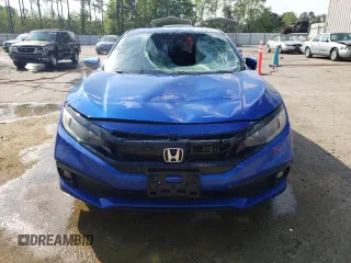 2019 Honda Civic Sport with VIN 2HGFC2F80KH521441, listed as a Copart auction lot 52235145 with 104,604 mi miles and Salvage title. Bid and sale history available at DreamBid. Image 5.
