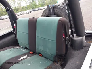 2003 Jeep Wrangler X with VIN 1J4FA39S13P363135, listed as a IAAI auction lot 42275729 with 178,138 mi miles and . Bid and sale history available at DreamBid. Image 8.