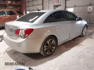 2011 Chevrolet Cruze LTZ with VIN 1G1PH5S98B7144253, listed as a IAAI auction lot 41753692 with 208,873 mi miles and . Bid and sale history available at DreamBid. Image 4.