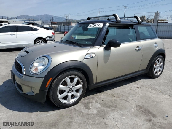 2009 MINI Cooper Hardtop S with VIN WMWMF73579TV39854, listed as a Copart auction lot 49739105 with 124,824 mi miles and Clean Title. Bid and sale history available at carsss.com. Image 1.