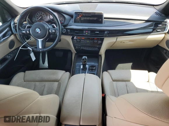 2016 BMW X5 xDrive50i z VIN 5UXKR6C50G0J81828, wystawiony jako Copart lot #52572315 z przebiegiem 91 737 mil mil oraz Szkoda całkowita • Salvage title. Historia ofert i sprzedaży dostępna na DreamBid. Obrazek 8.
