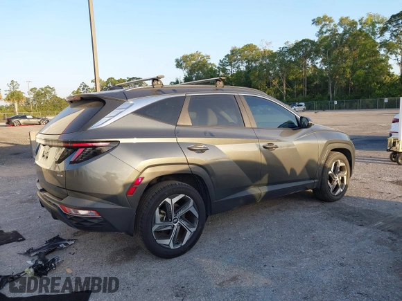 2022 Hyundai Tucson SEL z VIN 5NMJCCAE0NH149457, wystawiony jako IAAI lot #42166988 z przebiegiem 51 930 mil mil oraz . Historia ofert i sprzedaży dostępna na DreamBid. Obrazek 4.