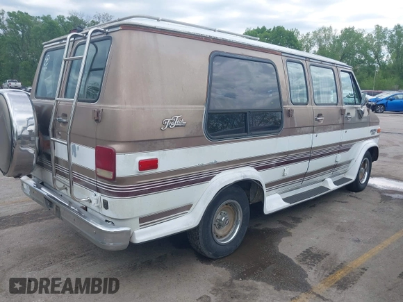 1989 Chevrolet Chevy Van z VIN 1GBEG25K3K7108022, wystawiony jako IAAI lot #42105947 z przebiegiem 51 822 mil mil oraz . Historia ofert i sprzedaży dostępna na DreamBid. Obrazek 4.