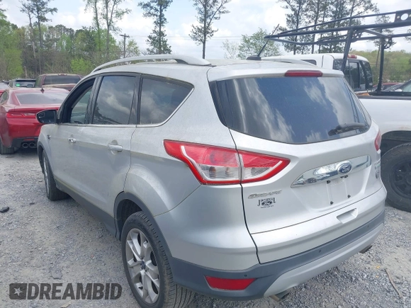 2015 Ford Escape Titanium with VIN 1FMCU0J98FUA87044, listed as a IAAI auction lot 41952096 with 257,437 mi miles. Bid and sale history available at carsss.com. Image 3.