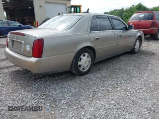 2003 Cadillac DeVille z VIN 1G6KD54Y73U130593, wystawiony jako IAAI lot #42377235 z przebiegiem 133 656 mil mil oraz . Historia ofert i sprzedaży dostępna na DreamBid. Obrazek 4.