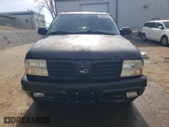 2000 Oldsmobile Bravada z VIN 1GHDT13W3Y2178106, wystawiony jako Copart lot #85069954 z przebiegiem 211 164 mil mil oraz Szkody całkowita. Historia ofert i sprzedaży dostępna na DreamBid. Obrazek 5.