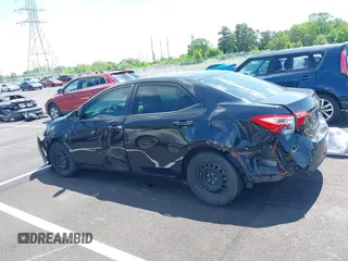 2019 Toyota Corolla L with VIN 5YFBURHE4KP860848, listed as a IAAI auction lot 42167529 with 152,301 mi miles. Bid and sale history available at carsss.com. Image 14.